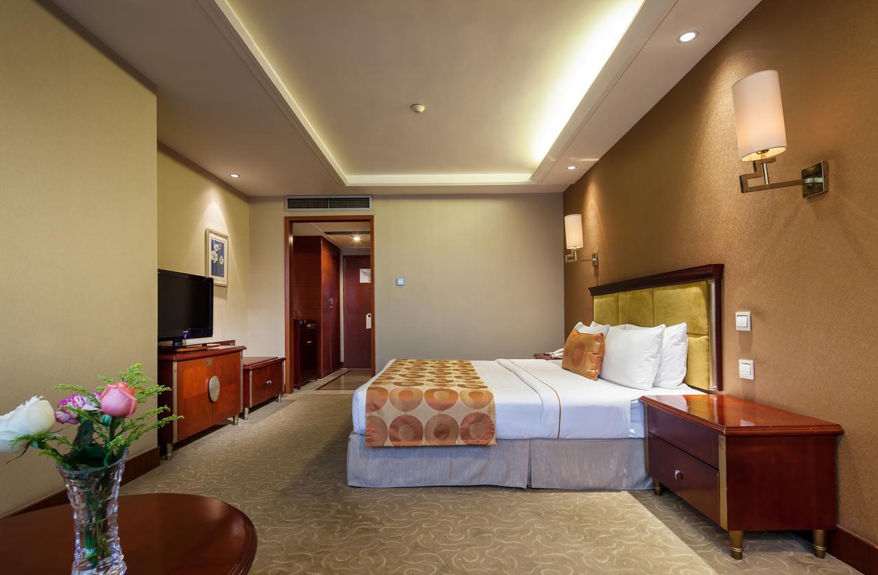Chengdu Xinliang Hotel Room photo